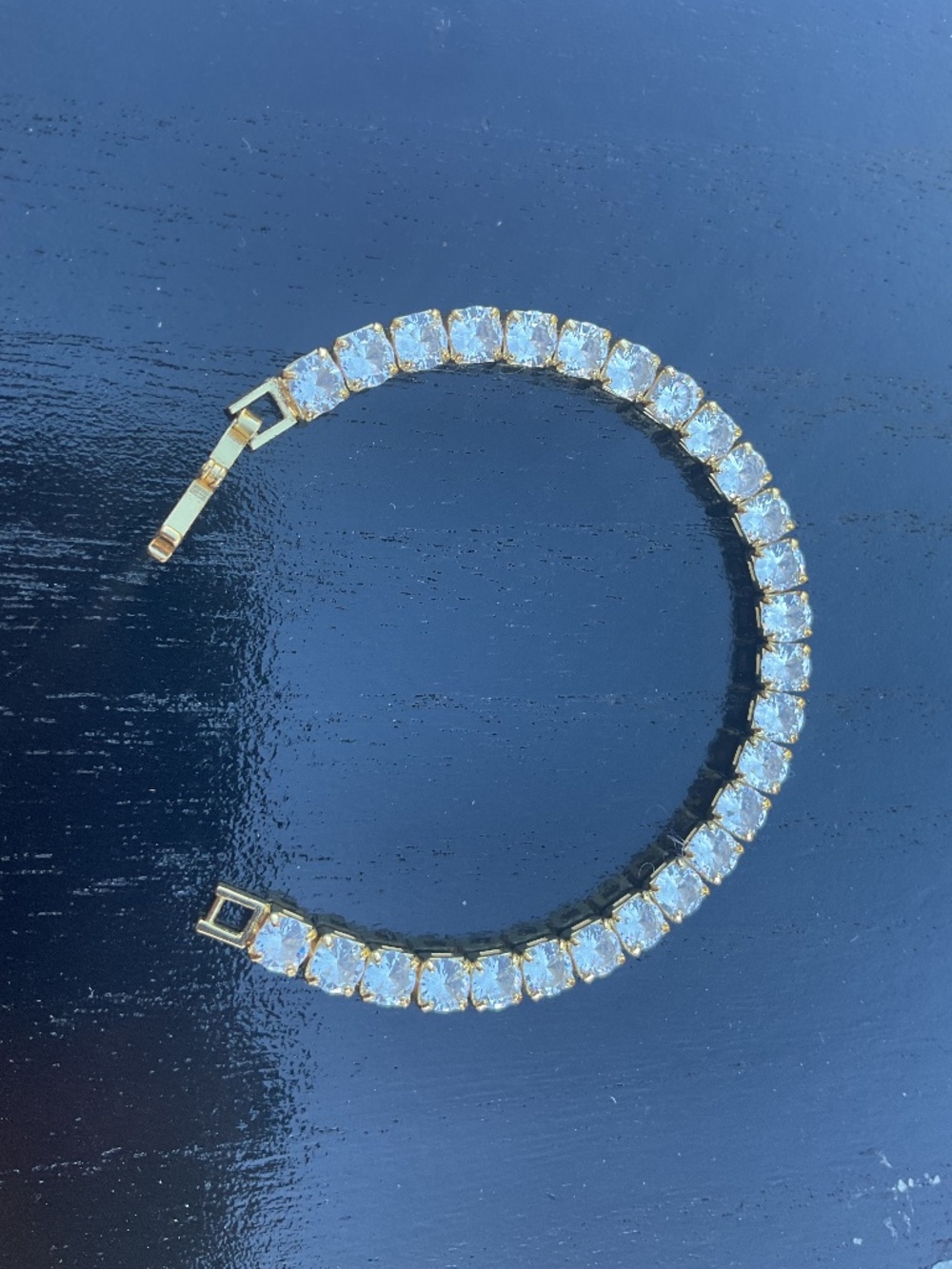 Goldtone Tennis Bracelet with Clear Stones
